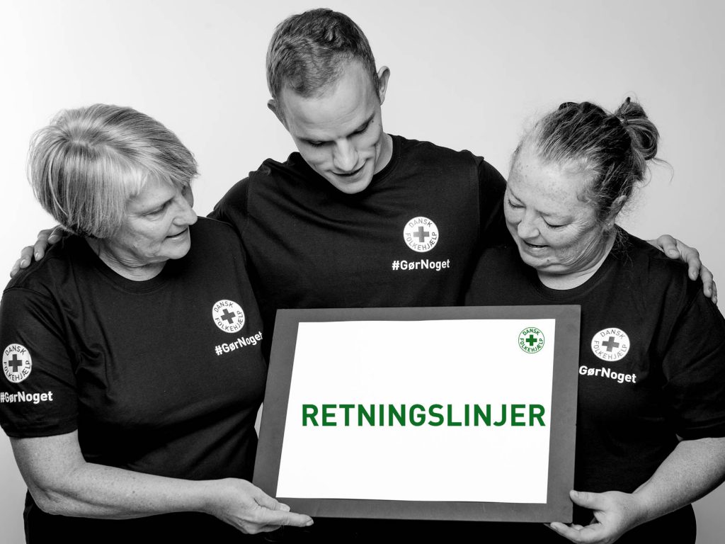 retningslinjer_frivillige_goer_noget_med_skilt