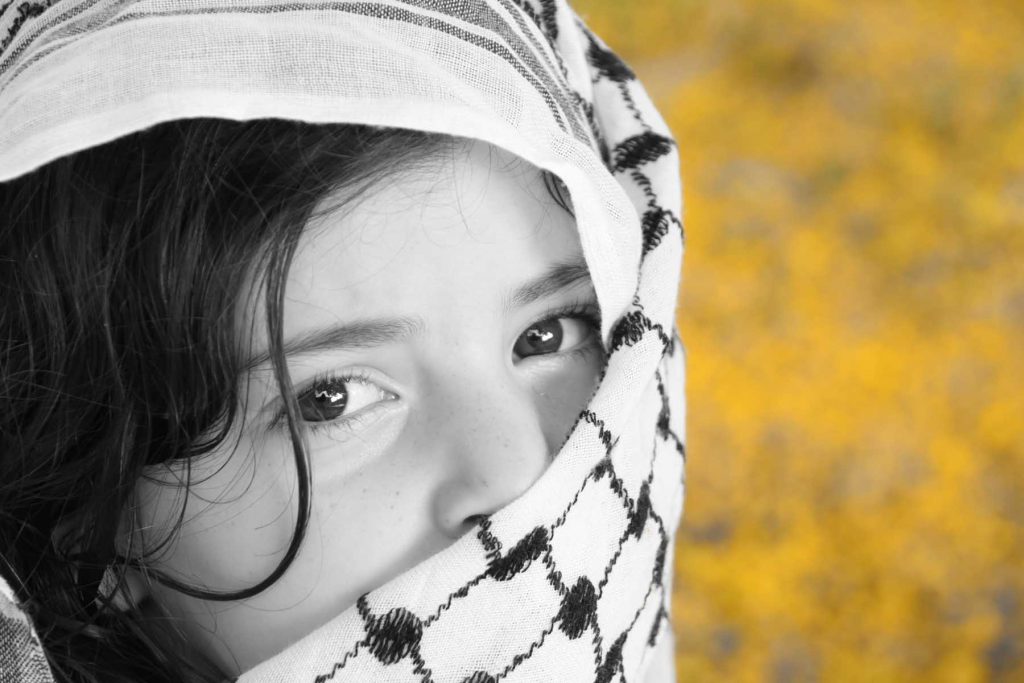 Afghan girl and (Arabic) kaffiyah Afghan girl and (Arabic) kaffiyah