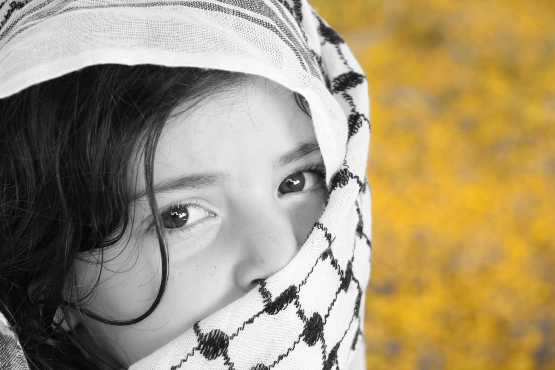 Afghan girl and (Arabic) kaffiyah